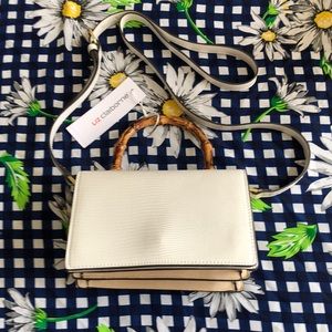 One size…white with amber top handle/long adjustable white strap shoulder bag